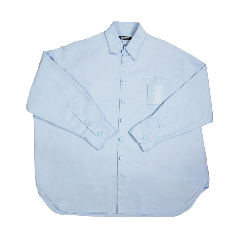 Raf Simons Oversized Denim Shirt In Light Blue - CNTRBND