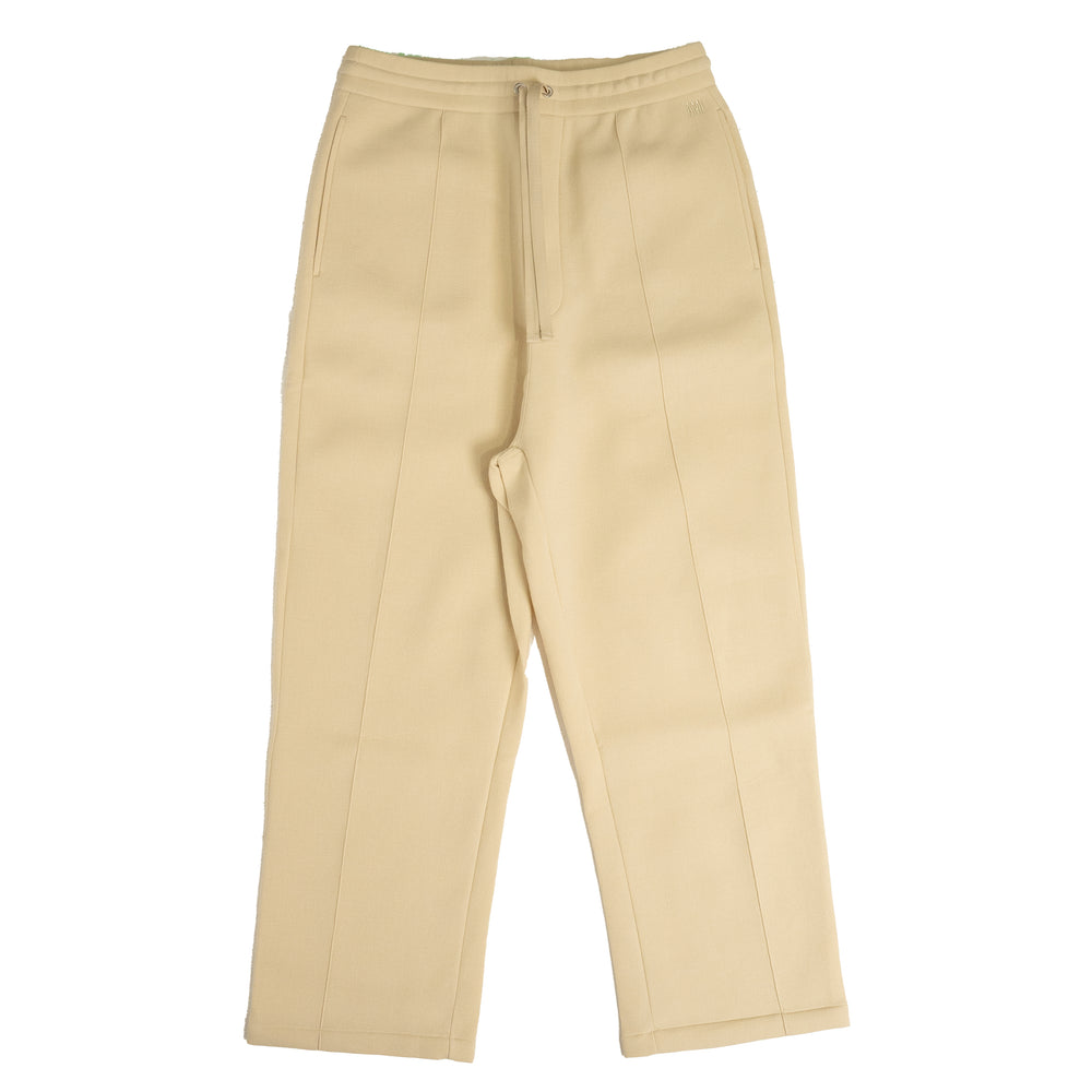 
                
                    Load image into Gallery viewer, AMI Paris Trackpants In Vanilla - CNTRBND
                
            