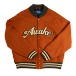 Awake NY Chenille Logo Varsity Jacket In Rust - CNTRBND
