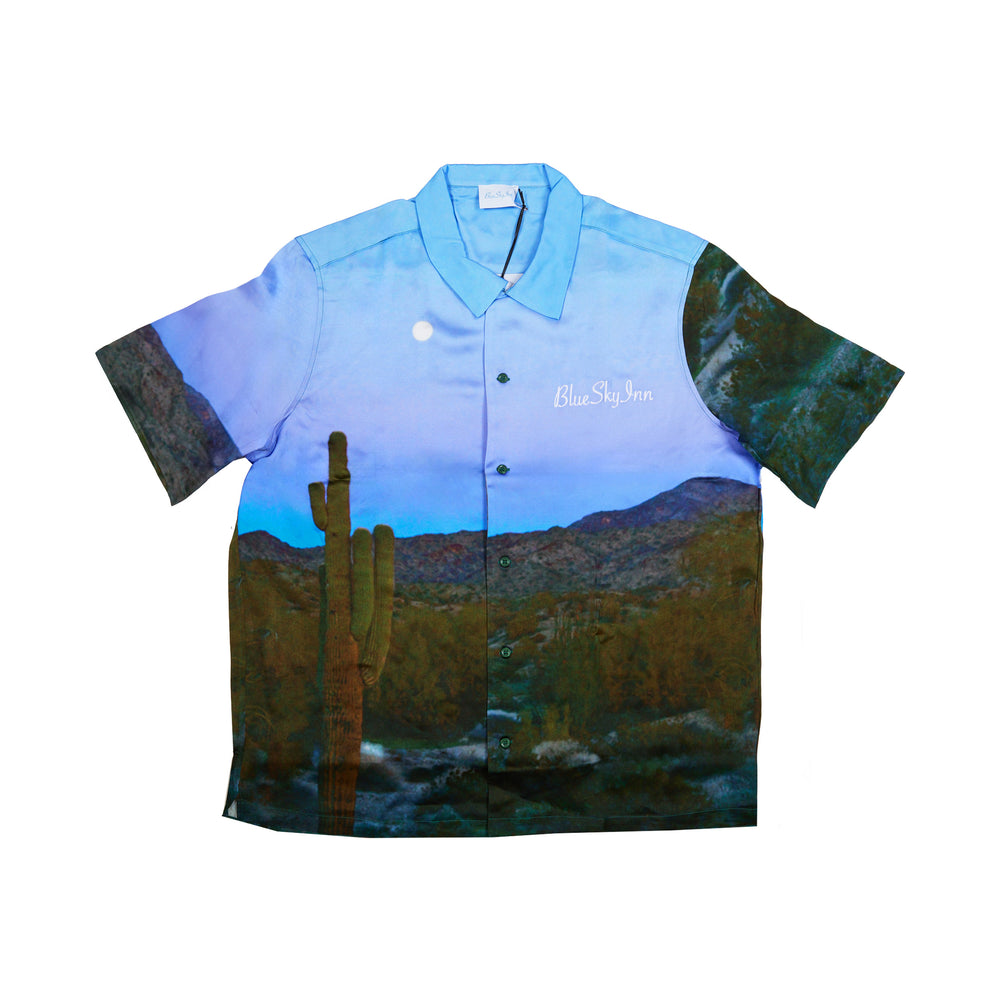
                
                    Load image into Gallery viewer, Blue Sky Inn Desert S/S Shirt In Blue - CNTRBND
                
            