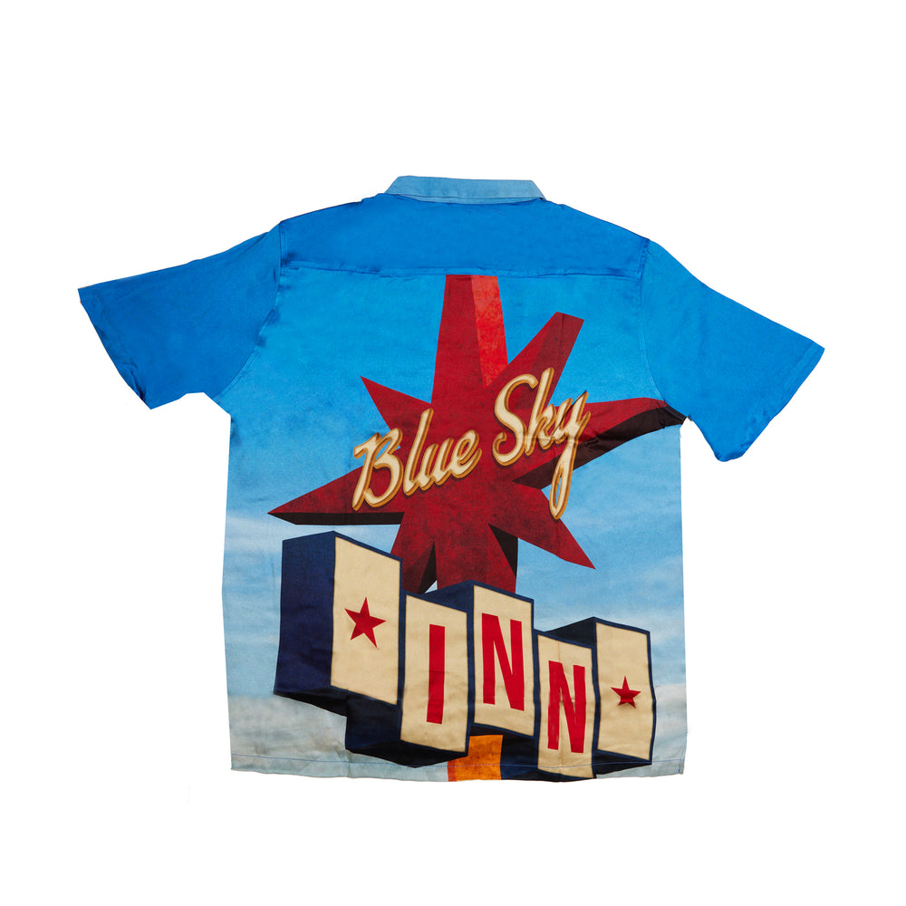 
                
                    Load image into Gallery viewer, Blue Sky Inn Sign S/S Shirt In Blue - CNTRBND
                
            