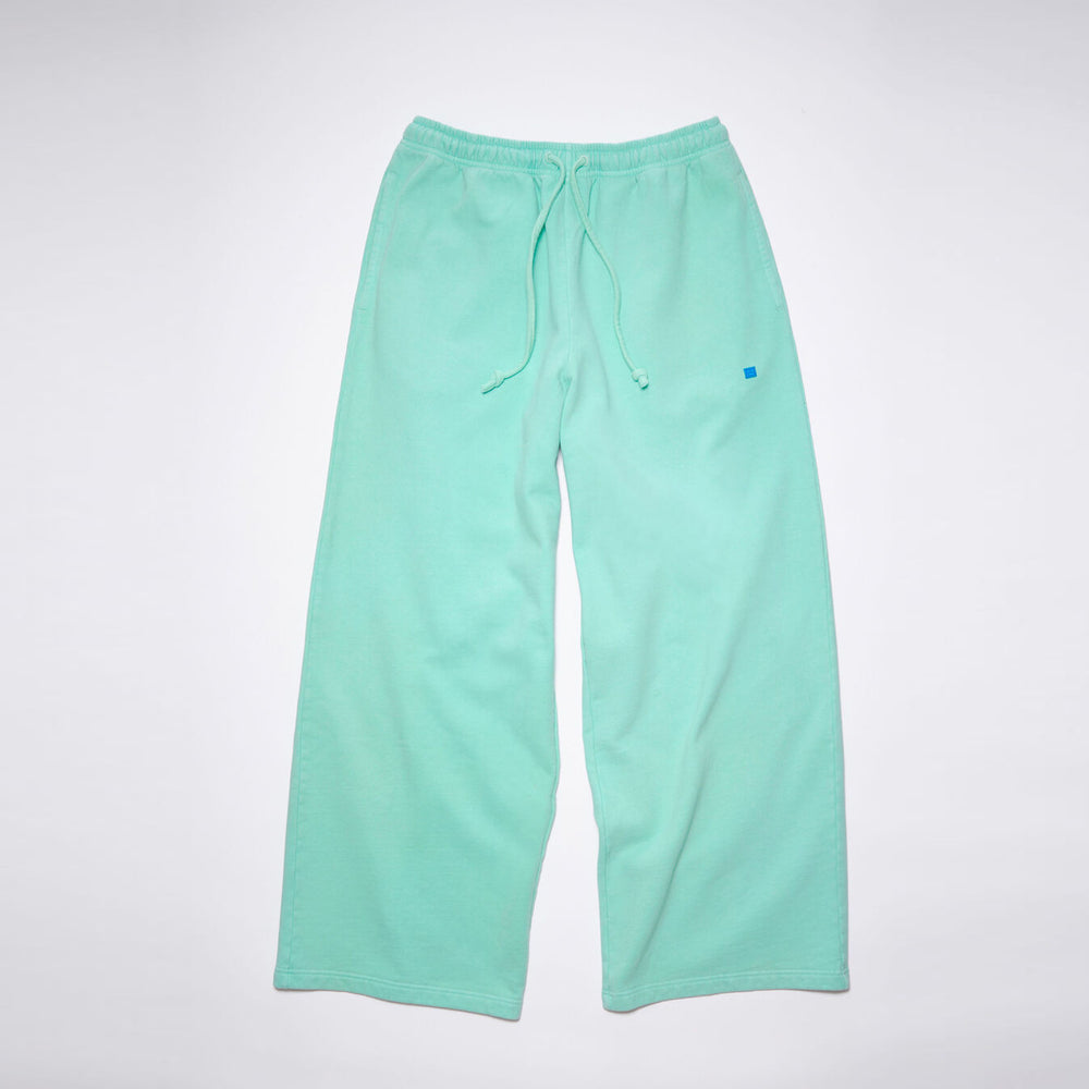 
                
                    Load image into Gallery viewer, Acne Studios Tiny Face Sweatpants In Sea Foam Green - CNTRBND
                
            