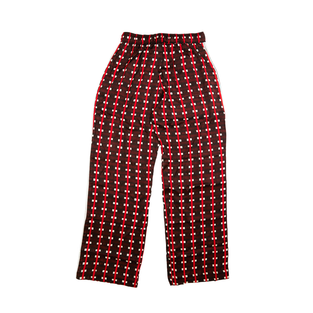Wales Bonner Snare Trousers In Brown/Red - CNTRBND