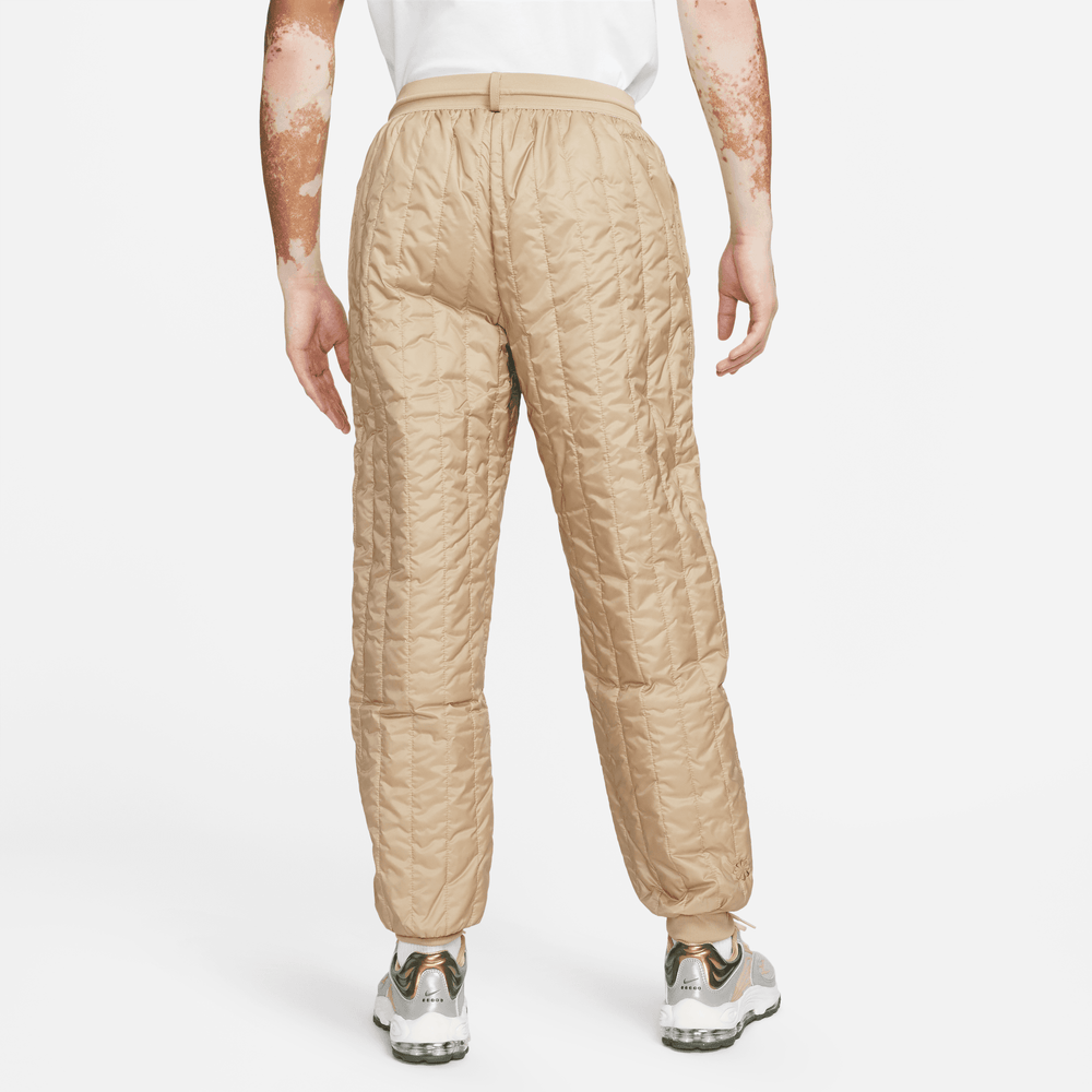 
                
                    Load image into Gallery viewer, Nike Sportswear Therma-FIT Tech Pants In Sandalwood - CNTRBND
                
            