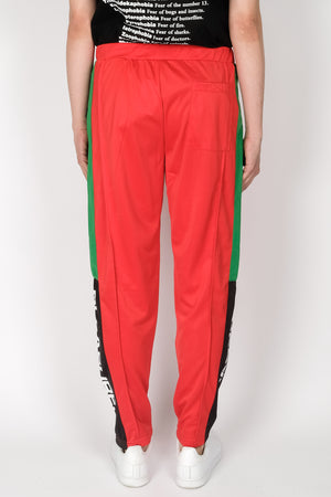 
                
                    Load image into Gallery viewer, PLEASURES Colorblock Track Pant In Red - CNTRBND
                
            