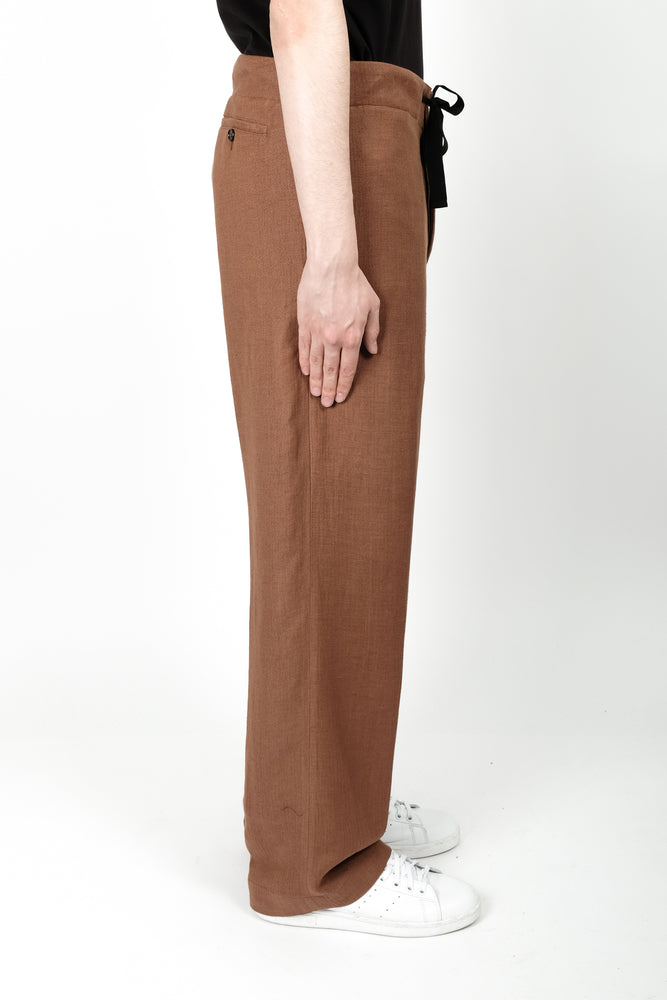 
                
                    Load image into Gallery viewer, Ann Demeulemeester Larry Trousers In Terracotta - CNTRBND
                
            