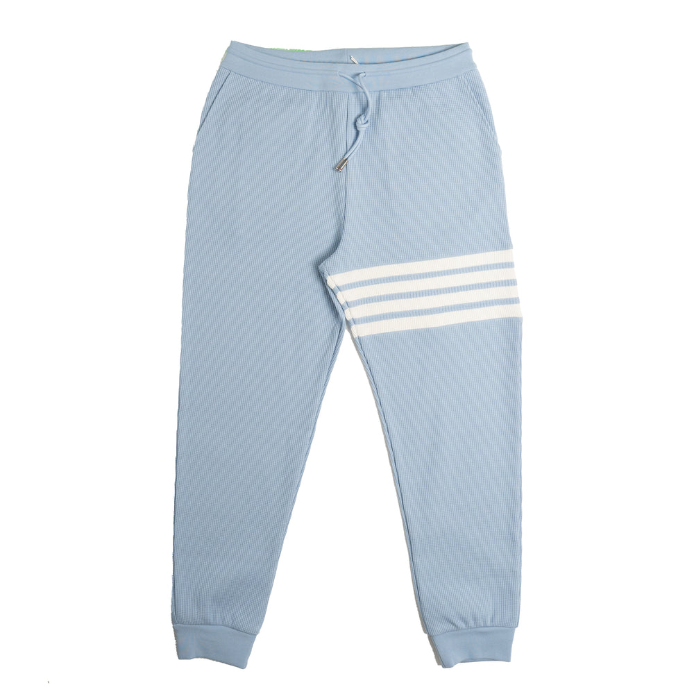 
                
                    Load image into Gallery viewer, Thom Browne Waffle Sweatpants In Lt Blue - CNTRBND
                
            